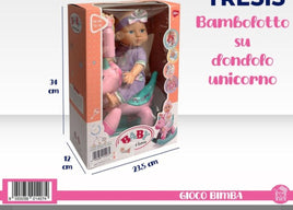 Bambolotto con dondolo unicorno